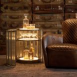 Timothy Oulton Shimmer Short Round Bar Cabinet in Flat Brass Faceted Glass is a glamorous, low-