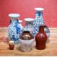 A diverse collection of nine decorative vases showcasing a blend of traditional Chinese and Japanese - Image 2 of 2