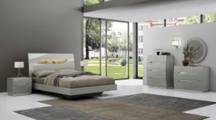 Lilly collection, a brand-new round mirror expertly finished in ultra-stylish cool grey lacquer