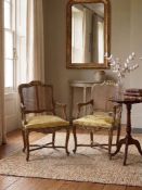 A Pair of Louis XIV style Armchair Amand This stately armchair, the 
