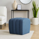 Marina Pouff Marina Pouff, beautifully upholstered in a textured mid-blue woven fabric. Designed