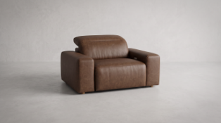Timothy Oulton Pudgie Motion Armchair in Buff Burnished Taupe brings pure indulgence and tailored