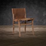 Timothy Oulton Sanctum Chair in Rowdy Sheen Ceena is a rustic, eco-conscious chair that delivers a