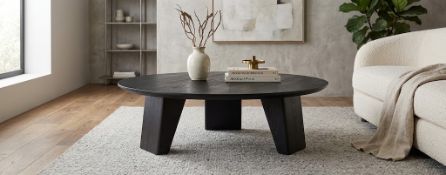 Timothy Oulton Keiko Round Coffee Table (100cm) in Matte Black is a bold, minimalist centrepiece