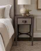 A pair of matching nightstands, each featuring a single drawer with a grey textured woven front