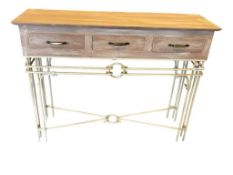 DISTRESSED MAUVE WOOD CONSOLE TABLE WITH THREE DRAWERS AND BEIGE COLORED METAL ROD BASE