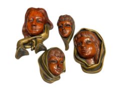 MID-CENTURY ACHATIT-WERKSTATTEN COMPOSITE STYLIZED WALL MASKS