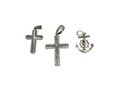 THREE STERLING SILVER CROSS PENDANTS INCLUDING ONE WITH VARIOUS CUT CZS