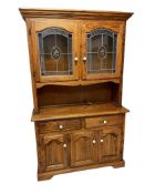 VINTAGE OAK LIGHTED HUTCH WITH ETCHED GLASS CABINET DOORS AND PORCELAIN KNOBS