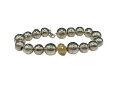 VINTAGE STERLING SILVER BEAD BRACELET FEATURING FACETED CRYSTAL CENTER