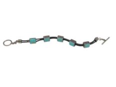 VINTAGE NAVAJO ARTIST SIGNED STERLING SILVER TURQUOISE LINK BRACELET WITH LEATHER STANDS