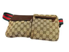 GUCCI GG MONOGRAM WAIST / BELT BAG WITH SIGNATURE RED AND GREEN STRIPE STRAP