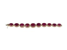 VAEL RUBIN STERLING SILVER YELLOW GOLD OVERLAY GRADUATED OVAL CUT RUBY AND DIAMOND LINK BRACELET