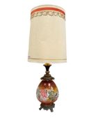 20TH CENTURY PAINTED GLASS LAMP WITH FLORAL DESIGN WITH BRASS FOOTED BASE
