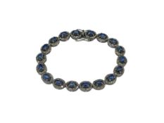 CHARMING 14K WHITE GOLD PLATED STERLING SILVER OVAL CABOCHON KYANITE AND DIAMOND BRACELET