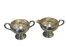 VINTAGE 20TH CENTURY EMPIRE WEIGHTED STERLING SILVER CREAMER AND SUGAR
