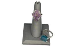 TWO STERLING SILVER FASHION RINGS FEATURING ONE WITH MARQUISE CUT AMETHYSTS