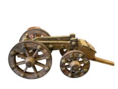 ANTIQUE SIGNAL CANNON WITH ARTILLERY CART / WAGON FEATURES CHARACTERS ON BODY AND WHEELS