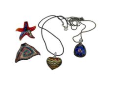 FOUR ART GLASS PENDANTS INCLUDING STARFISH, HEART, FLOWER, AND TRIANGULAR DESIGNS
