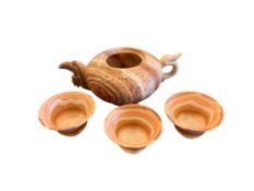 VINTAGE ALABASTER CARVED TEA SET FEATURING DRAGON FLOWER DESIGN ON TEAPOT WITH THREE TEACUPS