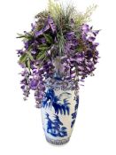 LARGE BLUE AND WHITE CERAMIC CHINOSERIE FLOOR VASE WITH FAUX SILK FLOWERS