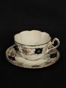 English Porcelain Teacup and Saucer with Gilt