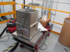 Tecweigh stainless-steel volumetric feeder, with stainless-steel hopper.