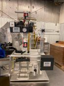 2020 UNIVERSAL IN-LINE FILLING SYSTEM AND UNIVERSAL 310 SEMI-AUTOMATIC ROUND PRODUCT LABELING SYSTEM