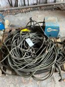 MILLER 22A 24V WIRE FEEDER WITH LARGE ASSORTMENT OF MIG WELDING GUNS, LEADS, AND HOSES