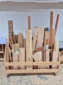 CUSTOM MOBILE LUMBER STORAGE CART WITH ASSORTED WOOD PLANKS AND HARDWOOD BOARDS
