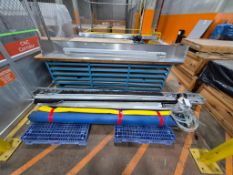 AUTOMATED ROLL-UP DOOR COMPONENTS AND STAINLESS STEEL GUARD WITH BLUE STEEL SHELVING RACK