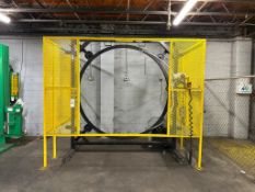HORIZONTAL ORBITAL STRETCH WRAPPER WITH SAFETY ENCLOSURE