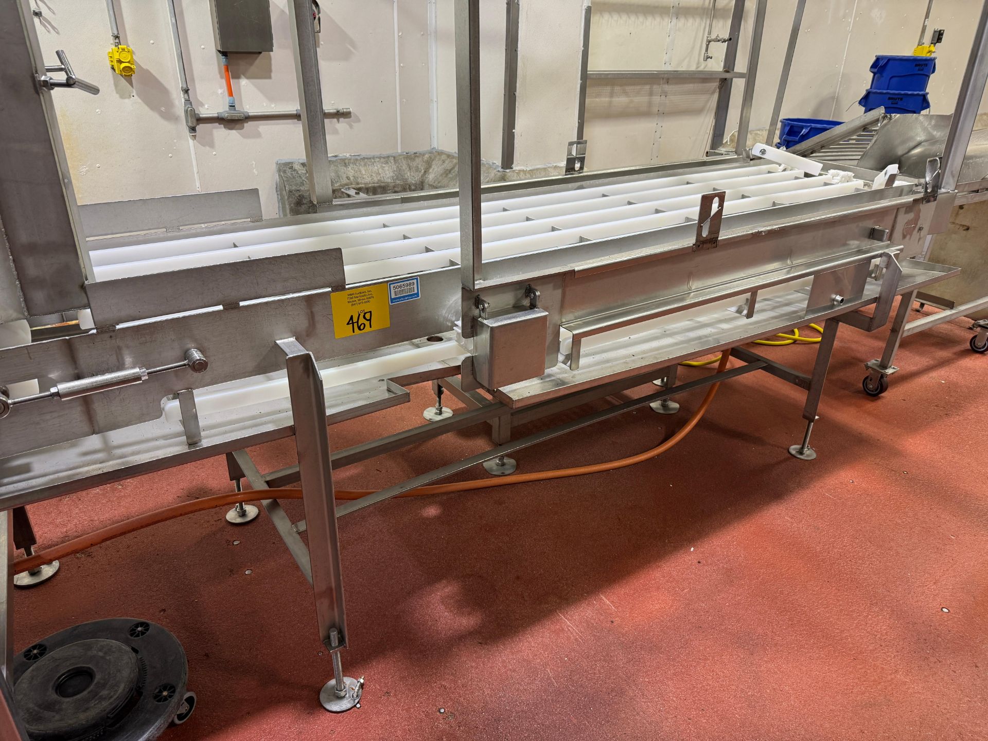 Stainless trim-inspection conveyor, approx 10' long, with wear strips ...