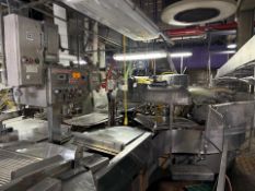 Cryovac Rotary Vacuum Chamber Packaging System