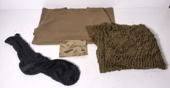 Various types of ex-military clothing - 161kg - may require repair or be as spares