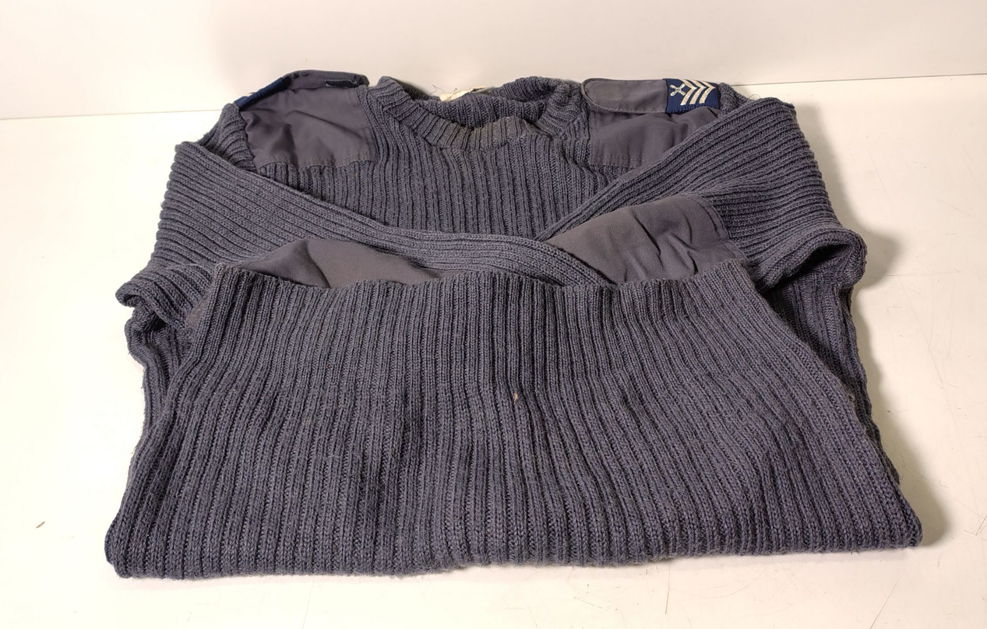 Various types of ex-military clothing - 200kg - may require repair or be as spares
