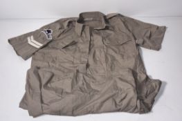 Various types of ex-military clothing - 204kg - may require repair or be as spares