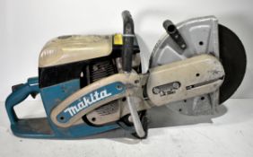 Makita DPC 6410 12 inch portable circular saw with cutting disc