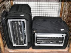2x Telecast Adder II audio multiplexer units in rack-mount transportation bag