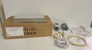 Cisco C117-4P Integrated Services router with power and connector cables