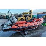 Tornado 5.1 RIB boat with Suzuki DT75 oil injection 2 stroke outboard engine on a trailer