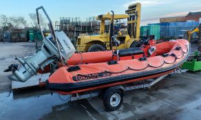 Tornado 5.1 RIB boat with Suzuki DT75 oil injection 2 stroke outboard engine on a trailer