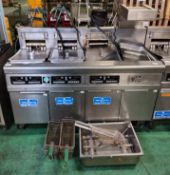 Frymaster RE17 (SN: 0701NJ0004) 4 door stainless steel triple tank electric fryer with dump station