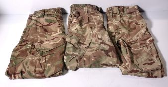 Various types of ex-military camo clothing - may include accessories - 207kg – may require repair