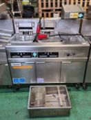 Frymaster FMRE217CSD (SN: 1502NI0031) 3 door stainless steel twin tank quad basket electric fryer