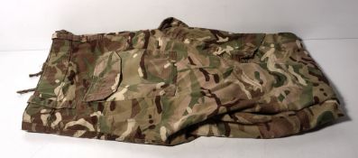 Various types of ex-military camo clothing - may include accessories - 184kg – may require repair