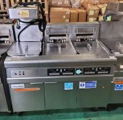 Frymaster FMRE217CSD (SN: 1208NI0016) 3 door stainless steel twin tank quad basket electric fryer