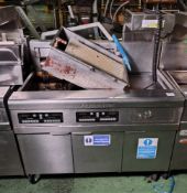 Frymaster RE17 (SN: 0806NI0009) 3 door stainless steel triple tank electric fryer with dump station