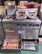 Frymaster FMRE217CSD (SN: 1212NI0020) 3 door stainless steel twin tank quad basket electric fryer