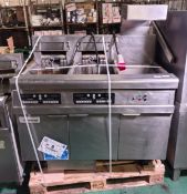 Frymaster FMRE217CSD (SN: 1404NI0007) 3 door stainless steel twin tank quad basket electric fryer
